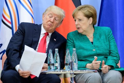 Трамп обсудил с Меркель проблему Украины - «Новороссия»
