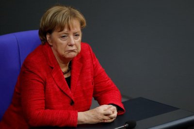 Меркель поздравила Порошенко с выходом во второй тур президентских выборов - «Новороссия»